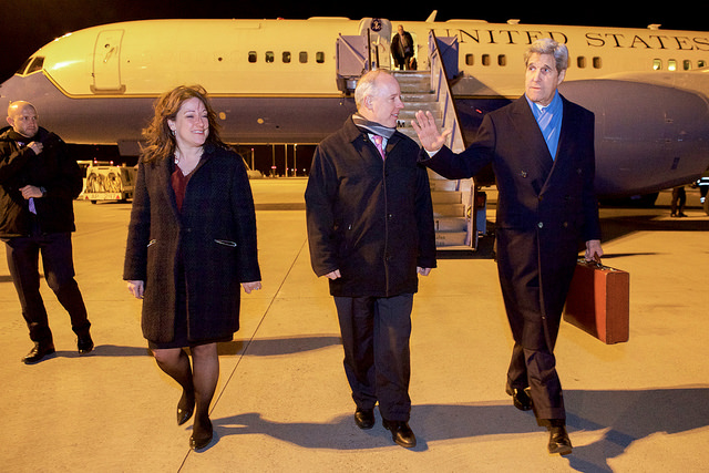 Secretary Kerry Walks With Embassy Berlin Deputy Chief Logsdon and Consulate Munich Consul Gravito After Arriving in Germany