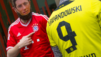 It is believed that the masked man is current Dortmund player Robert Lewandowski. Photo: MARC MUELLER