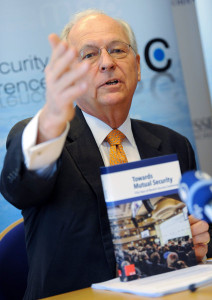 Chairman of the Munich Security Conference Wolfgang Ischinger holds up the book he published entitled "Towards Mutual Security. Fifty Years of Munich Securiy Conference" at a press conference in Munich, Germany, 22 January 2014. Photo: ANDREAS GEBERT